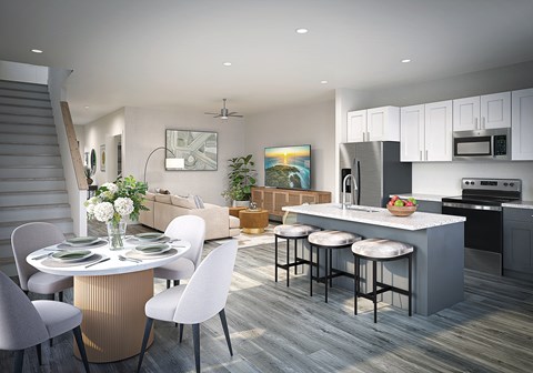 A modern kitchen with a dining table set for four.
